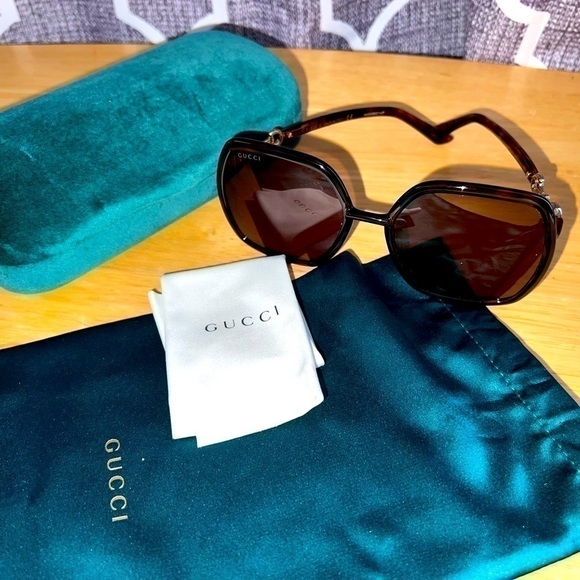 Gucci Accessories - New Gucci sunglasses with case, silk bag and cleaning cloth.
